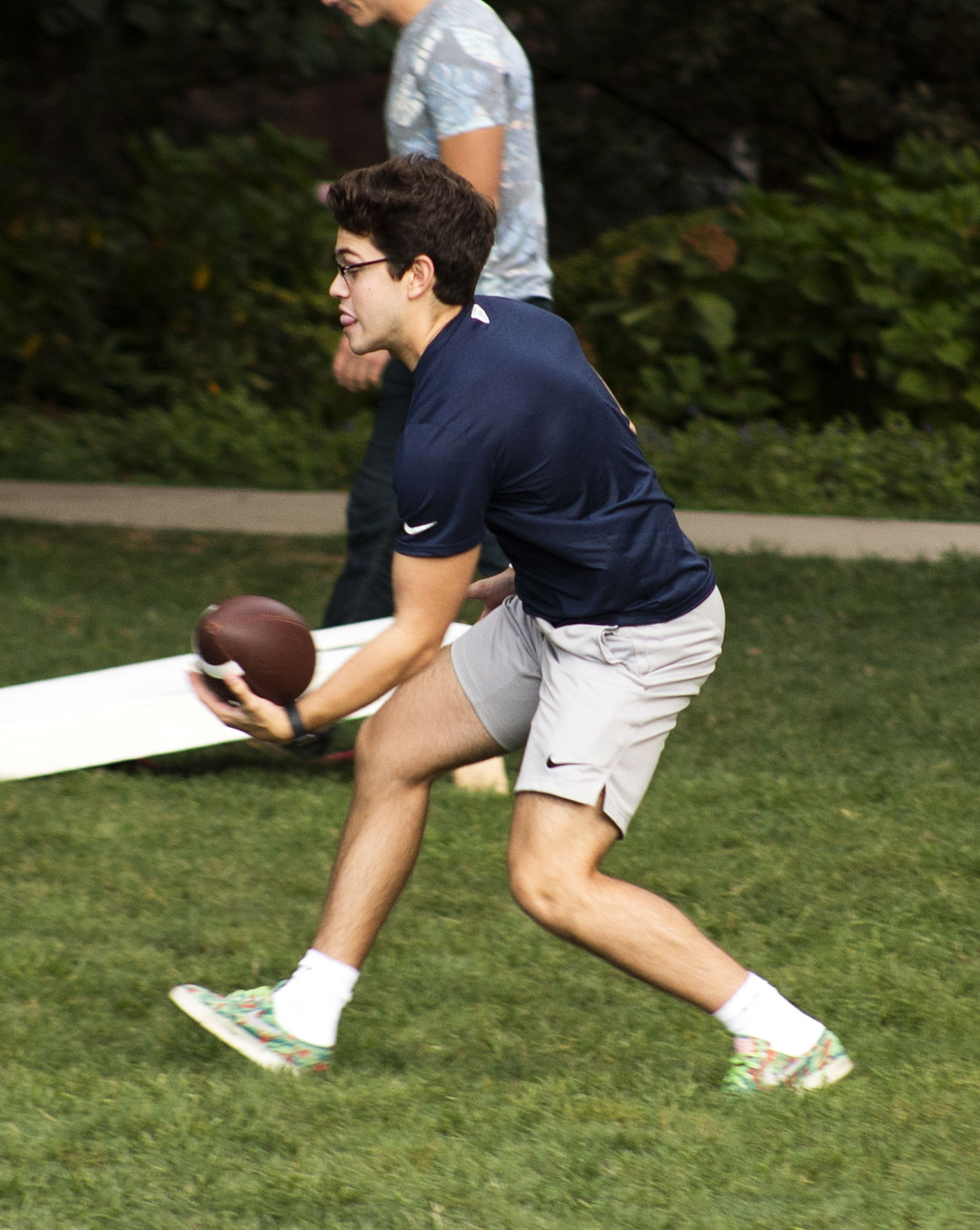 Armstrong Catching Football